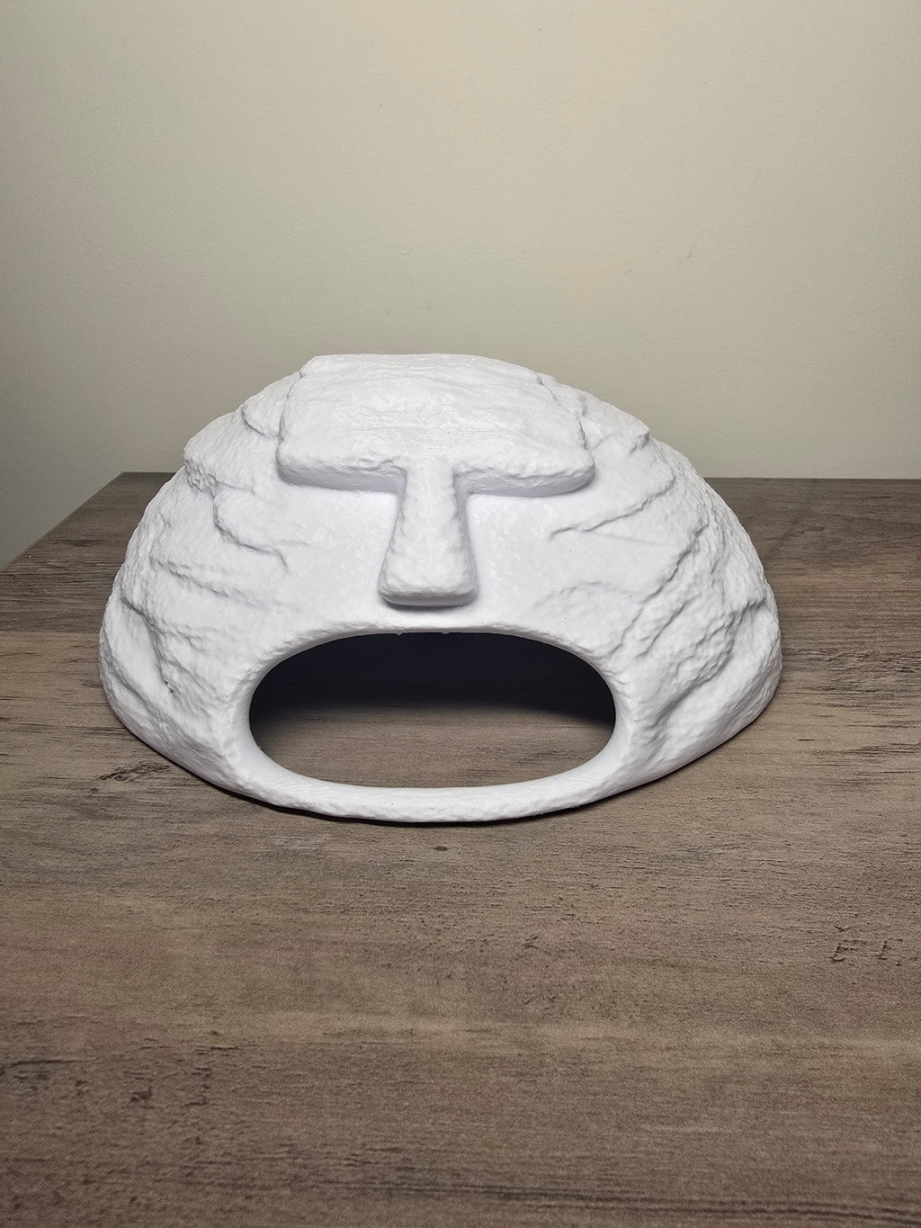 White domed aquarium cave with layered rock-look texture, a wide rounded entrance, and raised top detail