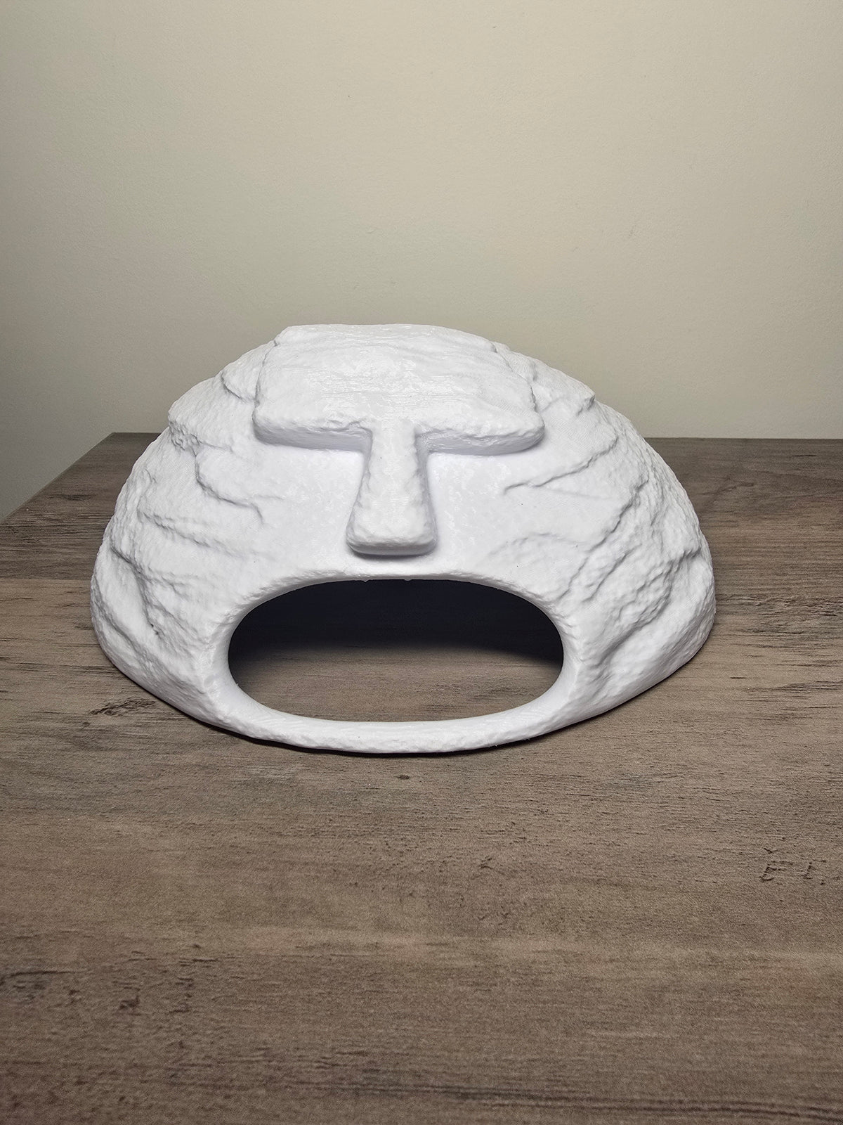 White domed aquarium cave with layered rock-look texture, a wide rounded entrance, and raised top detail