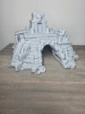 Stone-style aquarium pyramid with stepped walls, stairways, temple details, and an arched swim-through passage