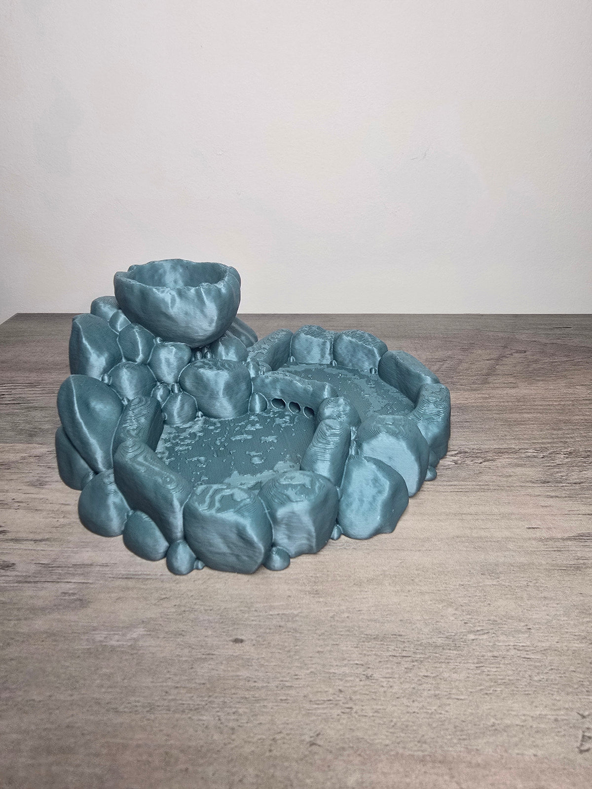 Rock-style reptile bowl with a lower basin and a smaller raised bowl on a textured rock formation