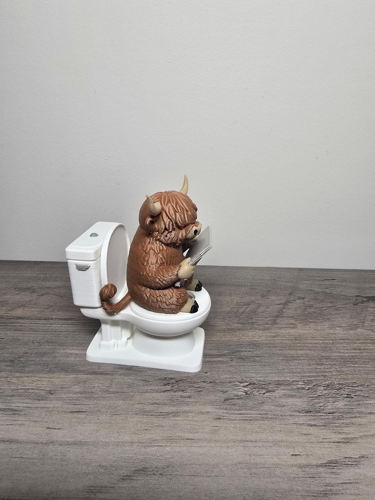 3D Printed Highland Cow on the Commode Figurine | Reading on the Throne | 4m3d Design Art